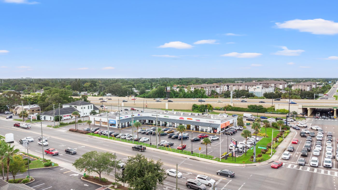 Elevated view of Lake Underhill Plaza with SR 408 and surrounding development in the background